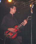 Dan Sartain playing guitar